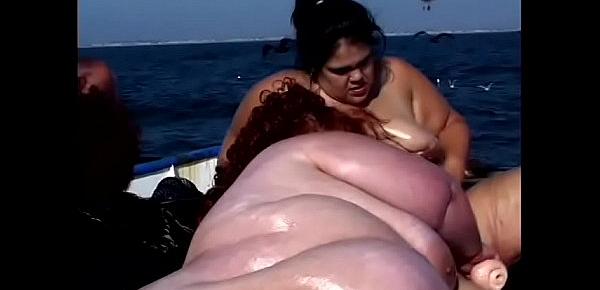  Four dirty BBW lifeguards fuck each other on the deck with toys on the boat